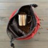WilderDog Dog Food Travel Bag Maroon with food inside and metal scooping cup