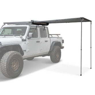 Front Runner Easy Out Awning 2.5 Black opened on driver side of Jeep Gladiator